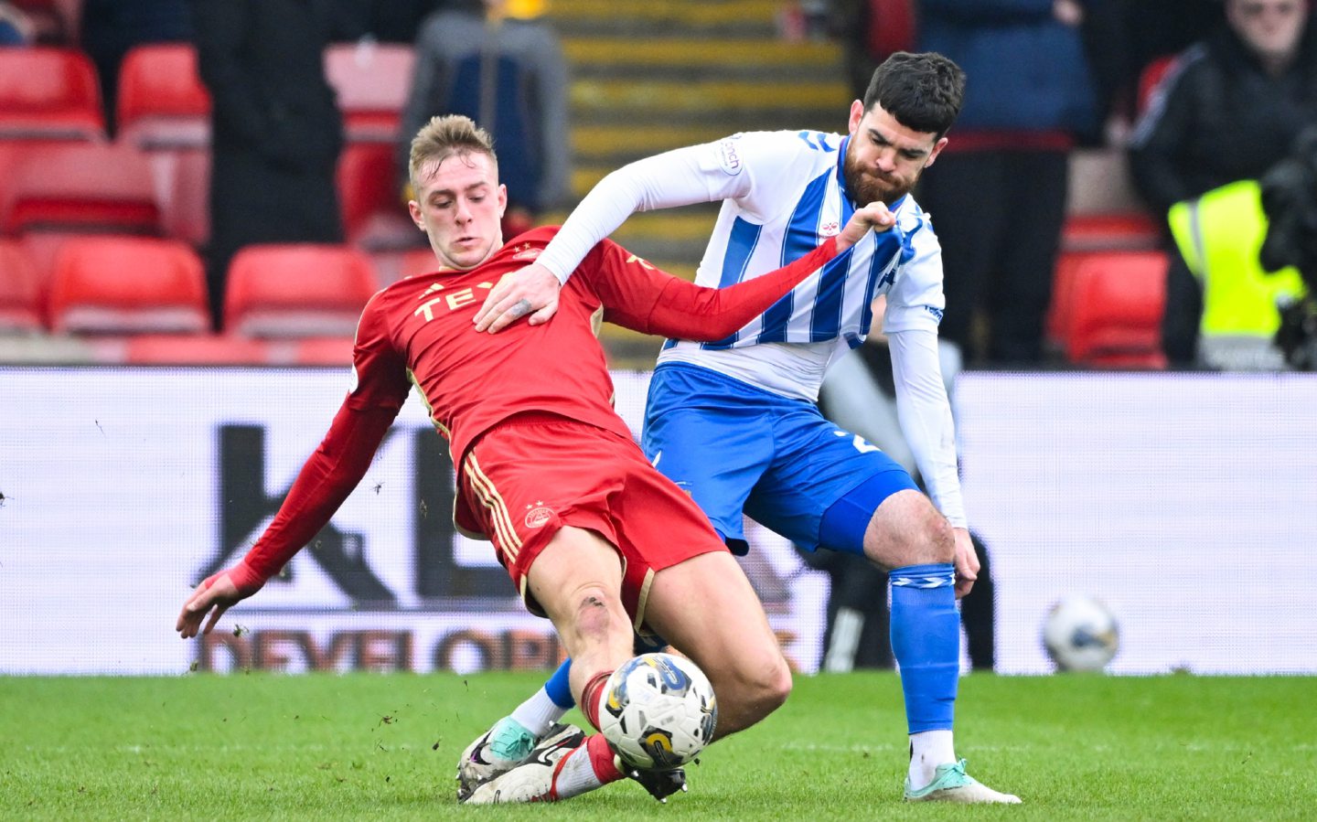 Aberdeen's Killian Phillips and Kilmarnock's Liam Donnelly in action during a Scottish Cup Quarter Final match.