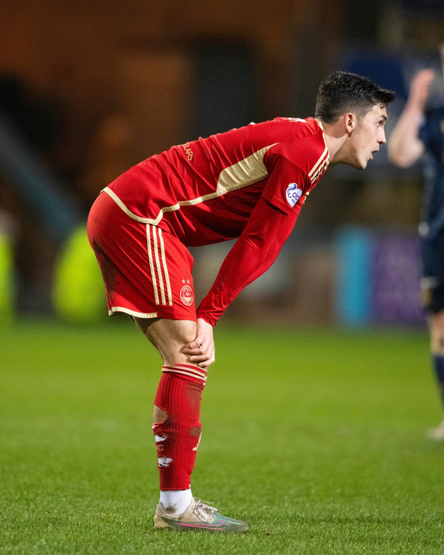Aberdeen's Jamie McGrath looks dejected at full time after losing 1-0 at Dundee. Image: SNS