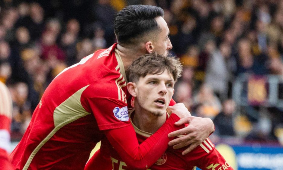 Aberdeen's Bojan Miovski hugging Leighton Clarkson in celebration