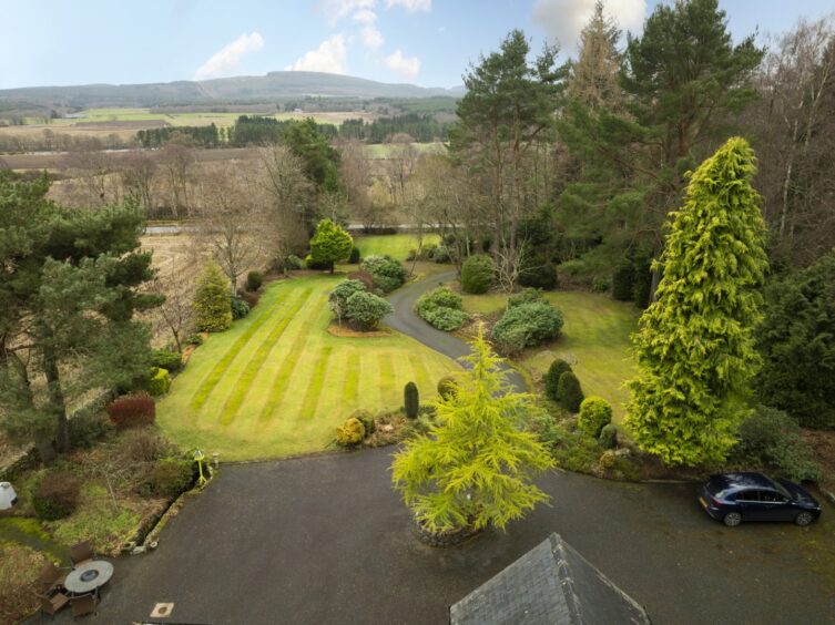 Aerial view of the large front garden at Davont, the house for sale near the Crathes Castle estate.