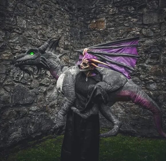 Laura Ripley with one of her dragons.