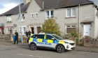 Police swarm house in Merkinch in Inverness.