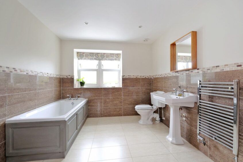 Large bathroom in Byrewalls at Newton of Drumgesk.