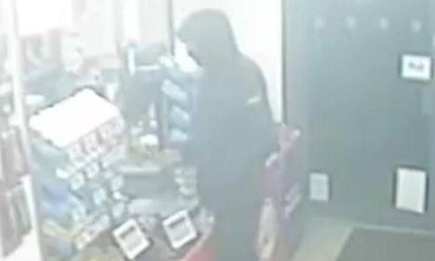 CCTV image of man at at Burghead store