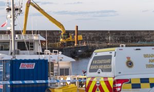 Buckie harbour has been sealed off while experts arrive on the scene to establish what the object is