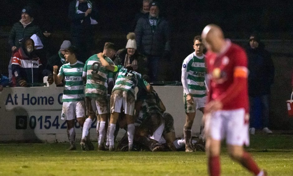 Buckie Thistle celebrating scoring the winner against Brechin City in a Highland League match at Victoria Park.