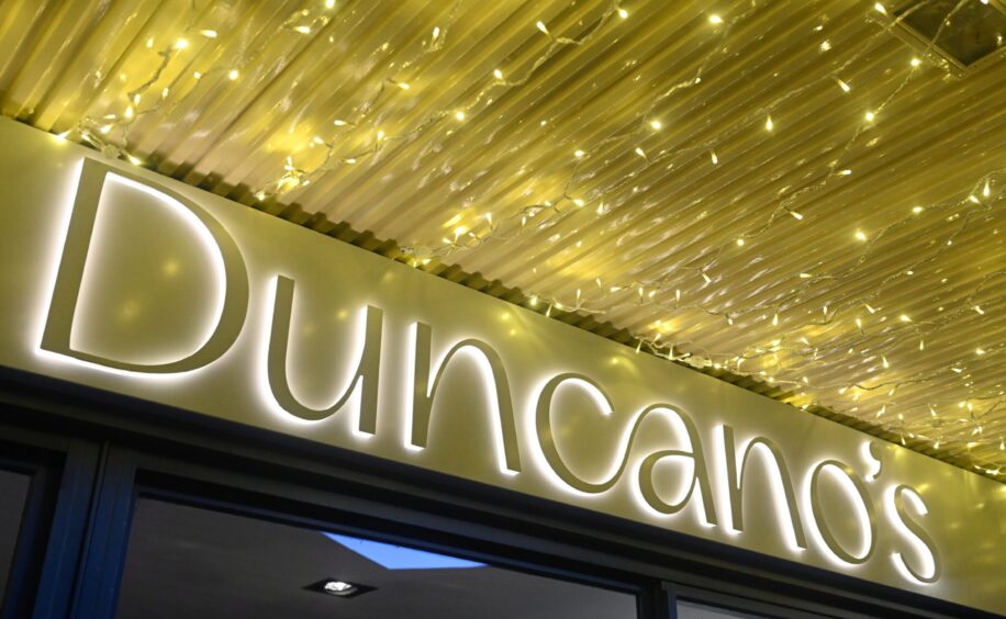 Duncano's gold sign.