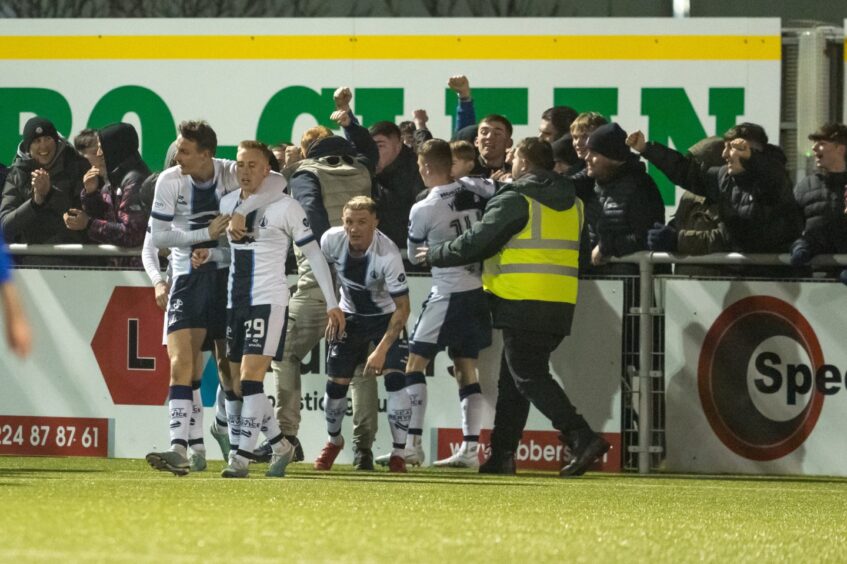 Falkirk celebrate after their winning goal against Cove Rangers.
