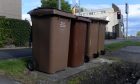 Brown garden waste bins in Aberdeen.