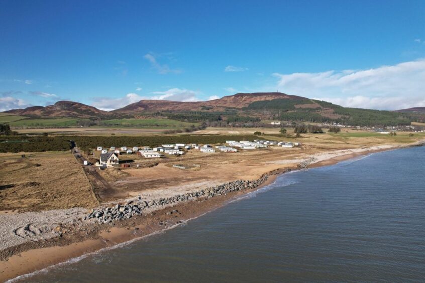 The caravan site next to the water