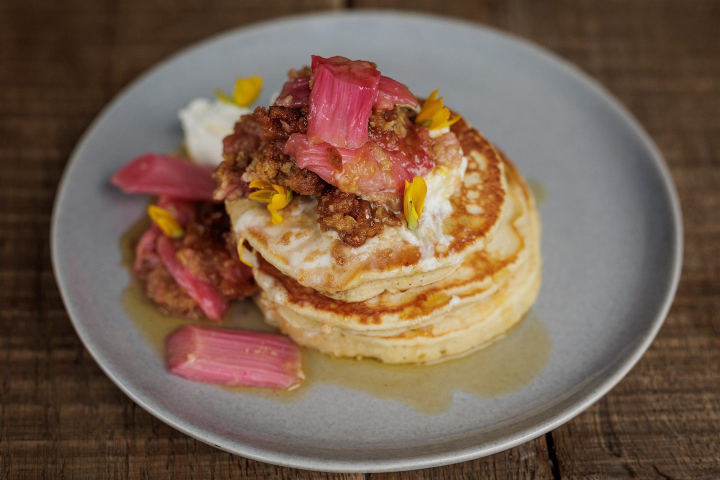 Scotch pancakes with rhubarb, gingernut crumble and gorse flower marscapone.