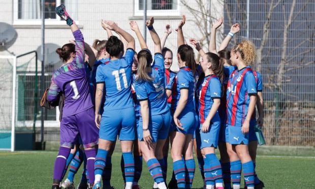 Caley Thistle Women in a pre-match team huddle before a SWF Championship match against Westdyke.