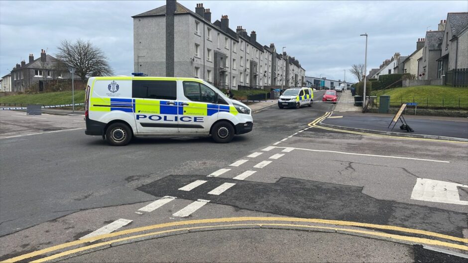 Two police vans at scene of Grampian Place crash