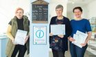 Donna Maclean, Lossiemouth Business Association, Janet Wilkinson, volunteer manager and Alison Read, Lossiemouth Community Development Trust, are ready to welcome visitors. Image: Jason Hedges/DC Thomson