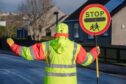 Volunteers of all ages could soon take on the role of school crossing patroller in Aberdeenshire. Image: Kenny Elrick/DC Thomson