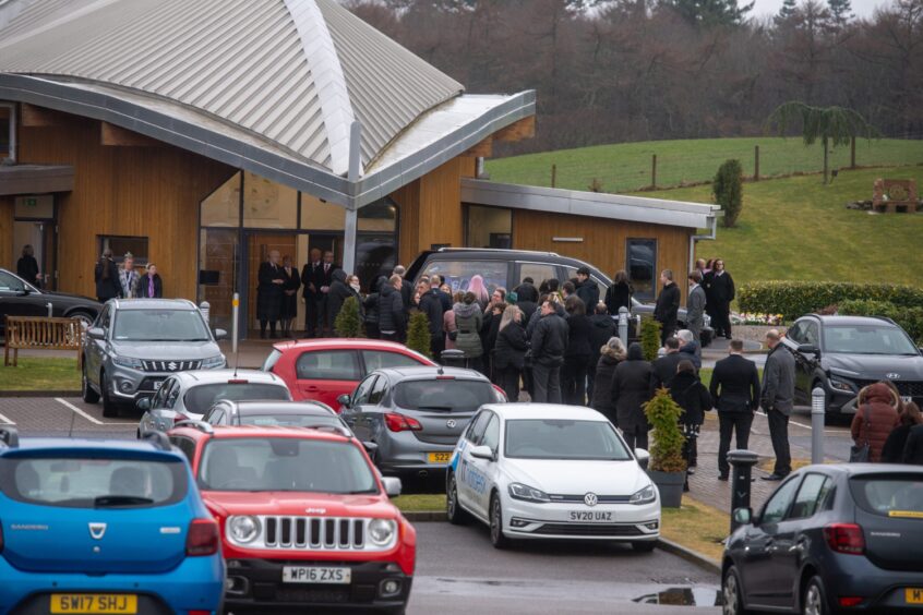 Crowd of people at Jessica Rennie's funeral at Baldarroch Crematorium.