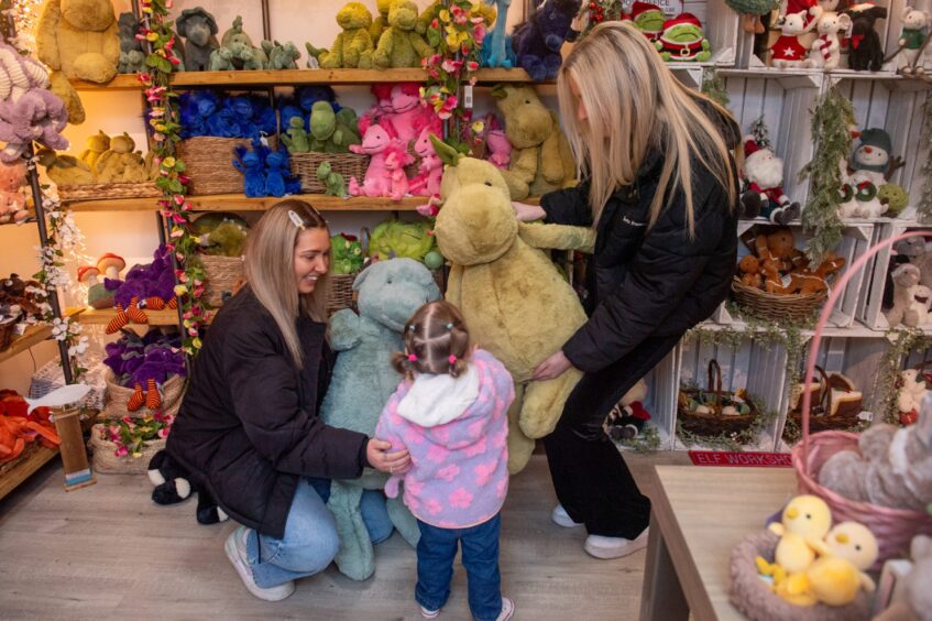 Customers Amber Kennedy, Lauren McDonald and two-year-old Esme enjoying a browse of the Jellycat collection in Midmar