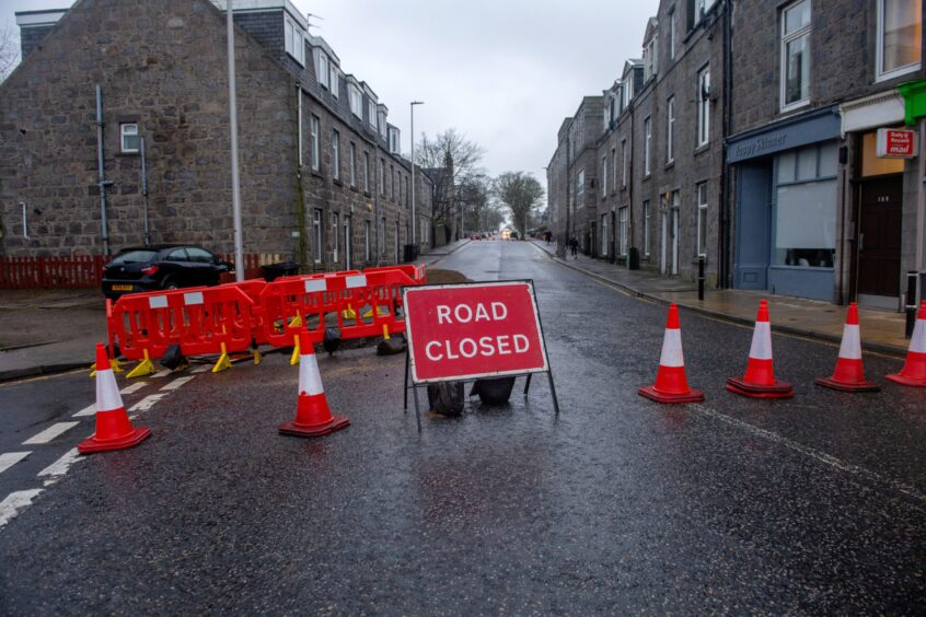 Road closed sign on Bon Accord Street between Caledonian Place and Springbank Terrace due to sinkhole