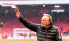 Departing interim Aberdeen manager Neil Warnock waves to fans as he walks off the pitch at full-time after the Dons beat Kilmarnock 3-1. Image: Stuart Wallace/Shutterstock