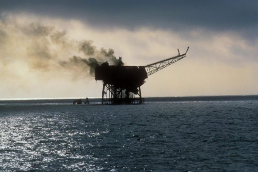 The Piper Alpha platform on fire in the North Sea..
