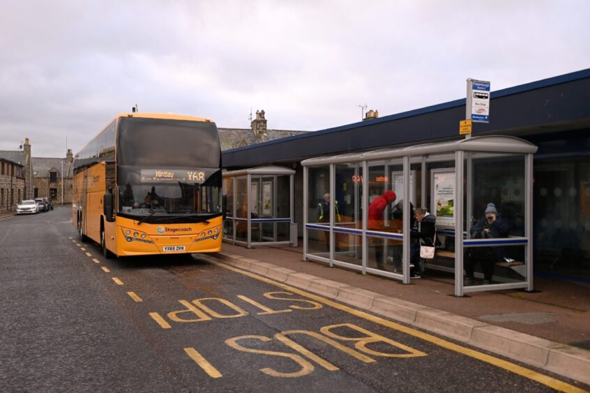 Yellow double decker bus, Stagecoach Service X68, on Hanover Street, Fraserburgh at the bus station.
