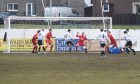 Sean Butcher, fourth from left, scores Fraserburgh's winning goal against Brora Rangers. Pictures by Sandy McCook/DCT Media.