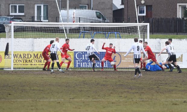 CR0047163
Brora Rangers v Fraserburgh at Dudgeon Park in the Breedon Highland League on March 2 2024.

Sean Butcher, number 17 fourth from left, scores Fraserburgh's winner against Brora.

Pictures by Sandy McCook/DCT Media.

Pics for Callum 
Captioned versions to follow.
Sandy McCook/DC Thomson
