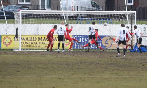 CR0047163
Brora Rangers v Fraserburgh in the Breedon Highland League at Dudgeon Park on March 2 2024.

Fraserburgh's Sean Butcher (17), fourth from left, scores their winning goal against Brora.

Pictures by Sandy McCook/DC Thomson.