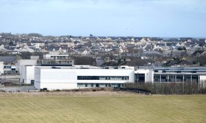 Wide shot of Wick High School.