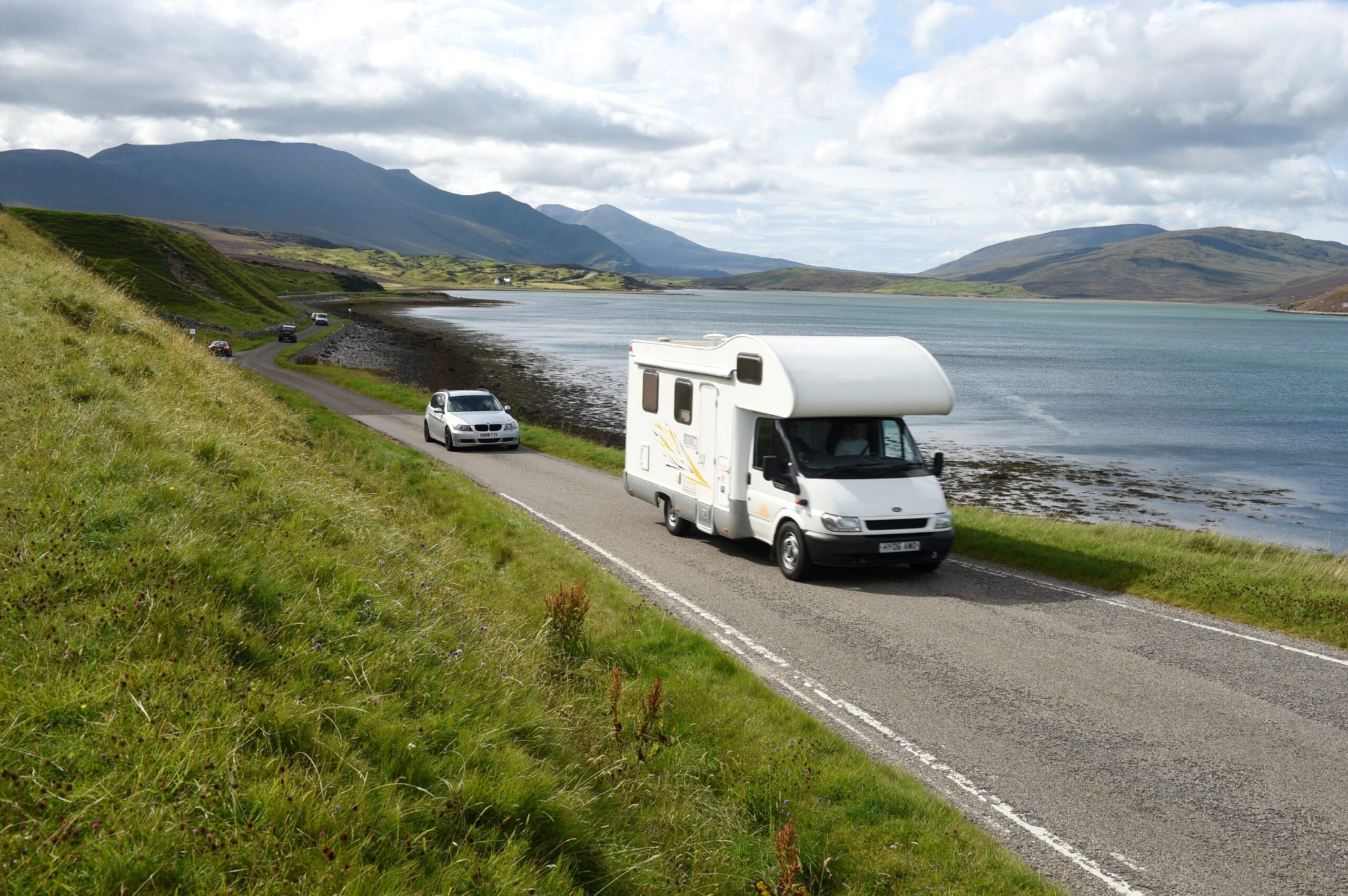 Motorhome driving through the Highlands.
