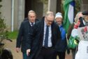 Scot Gardiner (centre) arriving at Highland Council HQ on Thursday with some of his Caley Thistle colleagues. Image: Sandy McCook/DC Thomson