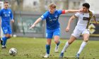 Peterhead's Andy McCarthy in action in the League Two defeat to Dumbarton.