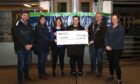 From left, George Low (ODAYFC), Nicola Tait (NFUS Orkney Branch), Jennifer Alexander (Orkney Auction Mart), Lindzi Williamson (Williamsons), Cameron Stout (Orkney Rocks Choir) and Alison Rich (OADS).