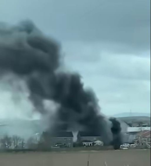 Plumes of smoke coming from a property in Newmachar. 