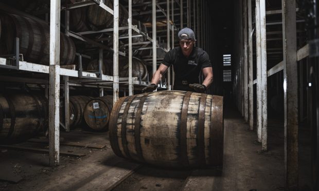 Coopers at work at the Speyside Cooperage.
