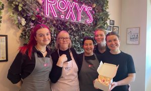 Roxy's staff with their famous muffins