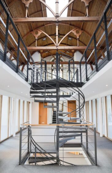The spiral staircase linking the floors of Aberdeen's Carden Church. Image: CBRE/Ryden