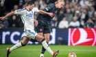 FC Copenhagen's Scott McKenna in action against Manchester City's Erling Haaland during the UEFA Champions League round of 16 first leg. Image: Shutterstock