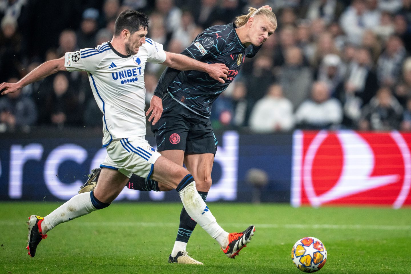 FC Copenhagen's Scott McKenna in action against Manchester City's Erling Haaland during the UEFA Champions League round of 16 first leg. Image: Shutterstock
