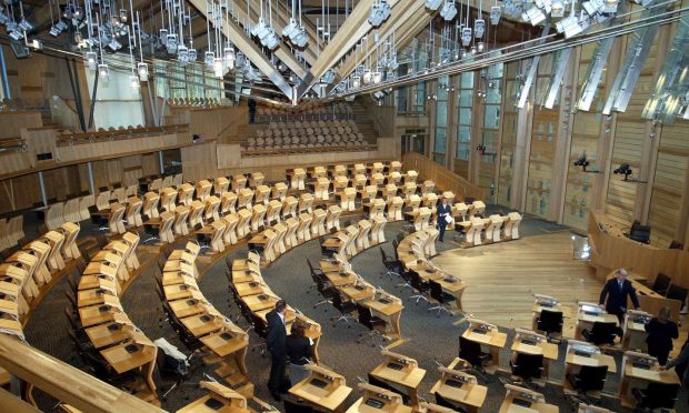 In the 25 years since the opening of the Scottish parliament building, many different MSPs have filled seats in its debating chamber. Image: James Fraser/Shutterstock