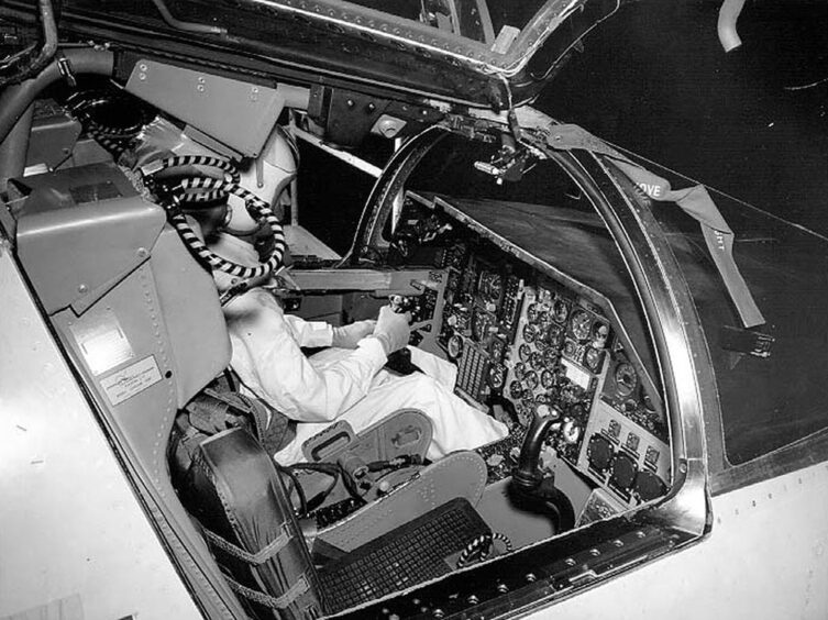 Cockpit of a fighter/bomber General Dynamics F1-11 fighter/bomber showing pilot sitting inside.
