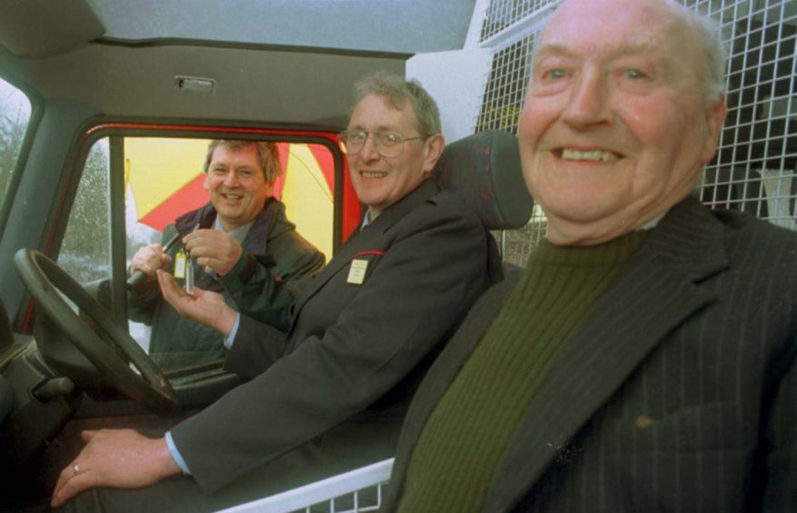 Celebrating the 25th anniversary of the Skye post bus service in 1997, from left, Royal Mail's director and general manager Alex Gibb, driver Nigel Nice and the original driver Ruaridh Nicolson.