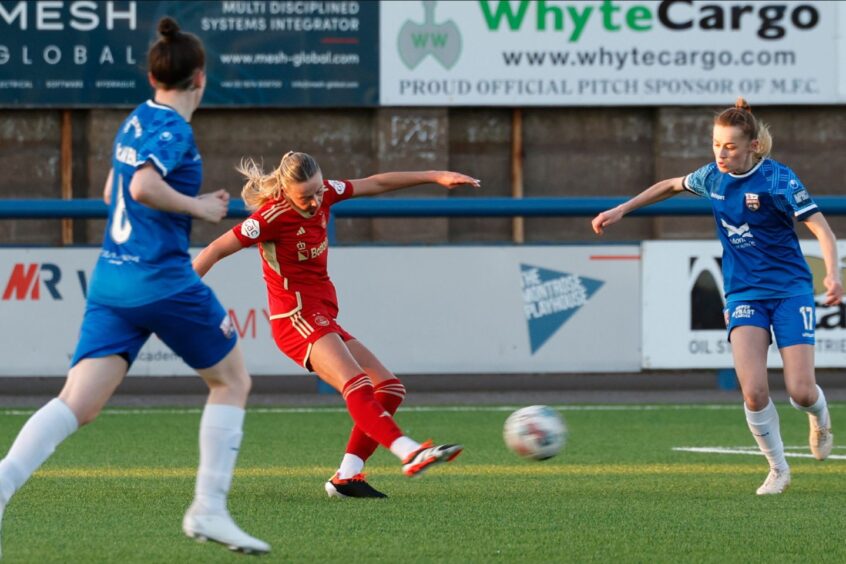 Hannah Innes, pictured, putting Aberdeen Women 1-0 up with a curling strike against Montrose at Links Park.