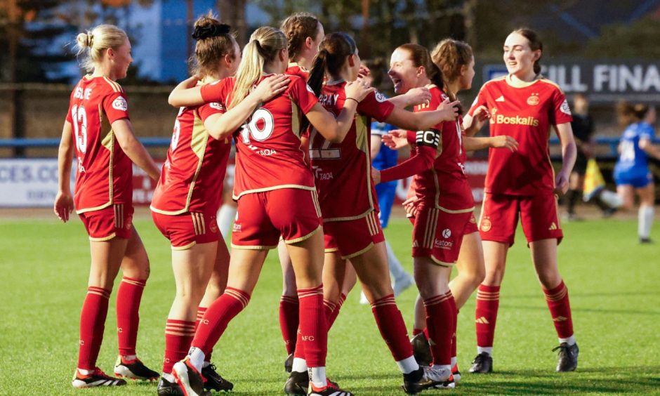 Aberdeen Women celebrate scoring in the SWPL match against Montrose.