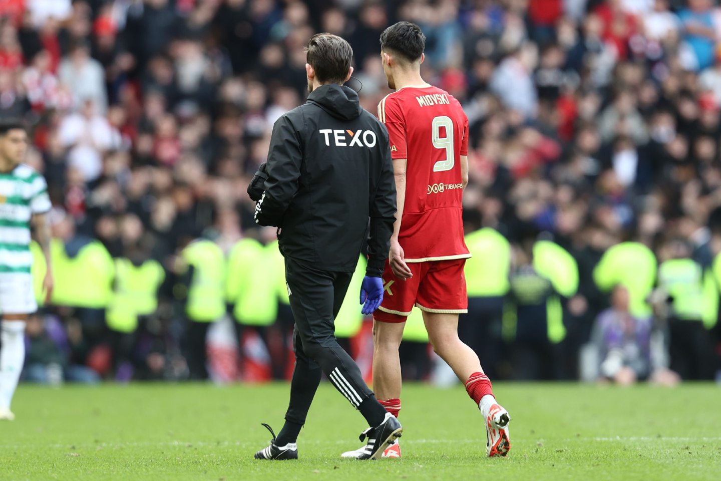 Bojan Miovski (9) of Aberdeen leaves the pitch injured during the Scottish Cup semi-final. 