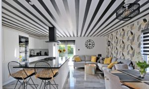 Ryan and Louise have certainly earned their stripes when it comes to home decor judging by the bold and beautiful ceiling in the kitchen. Image: Raeburn Christie Clark and Wallace