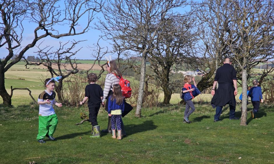 Youngsters at an Easter egg hunt in New Deer.