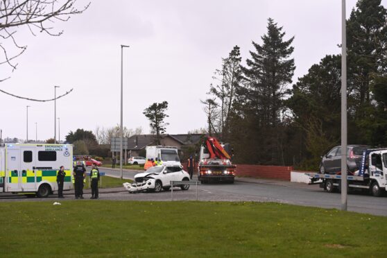 Recovery vehicles were on scene to remove the two cars from the road. Image: Darrell Benns/DC Thomson