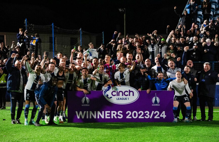 Falkirk celebrate winning the League One title.