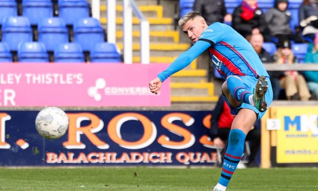 Wallace Duffy sweeps Caley Thistle into the lead against Arbroath.  Image: Ross MacDonald/SNS Group